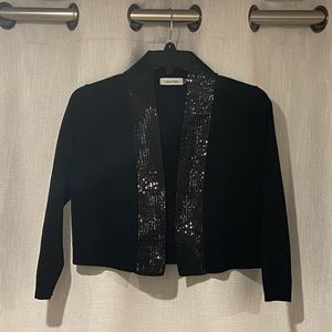 Glitzy Calvin Klein Shrug